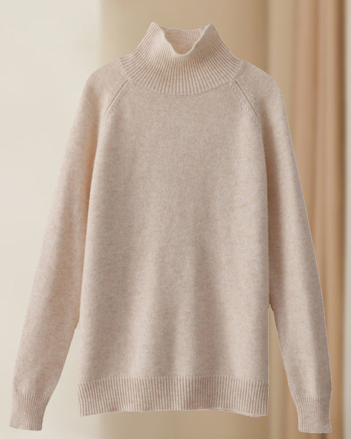Pull simple à manches longues et col haut de couleur unie