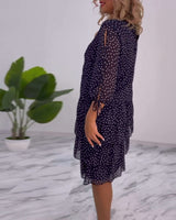 Robe élégante superposée à imprimé pois