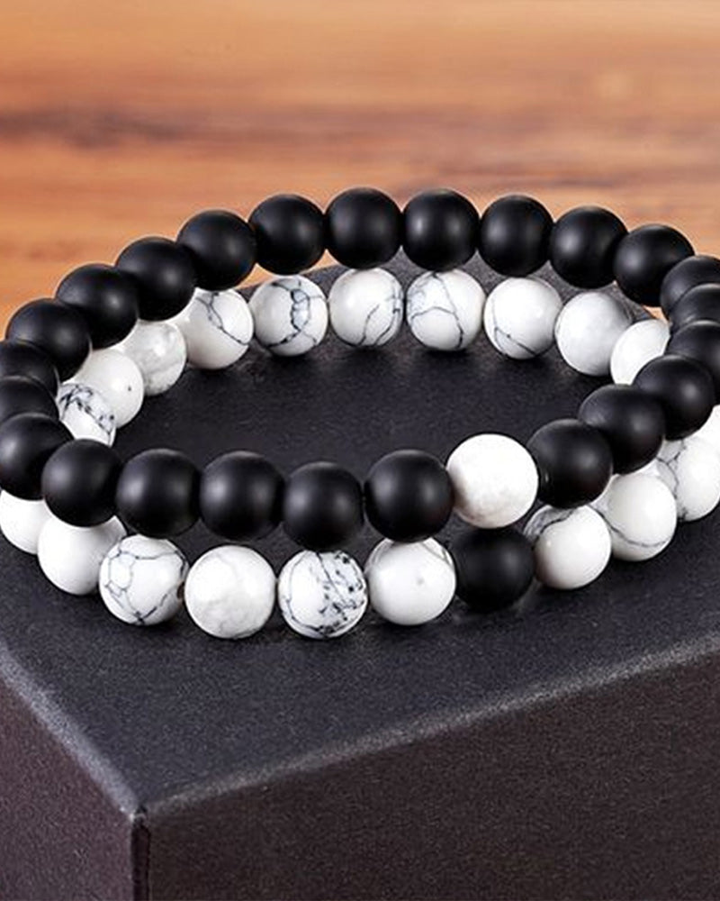 Ensemble de bracelets pour couple tissés en perles noires et blanches