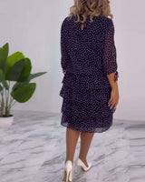 Robe élégante superposée à imprimé pois
