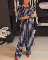 Costume élégant fendu à pois