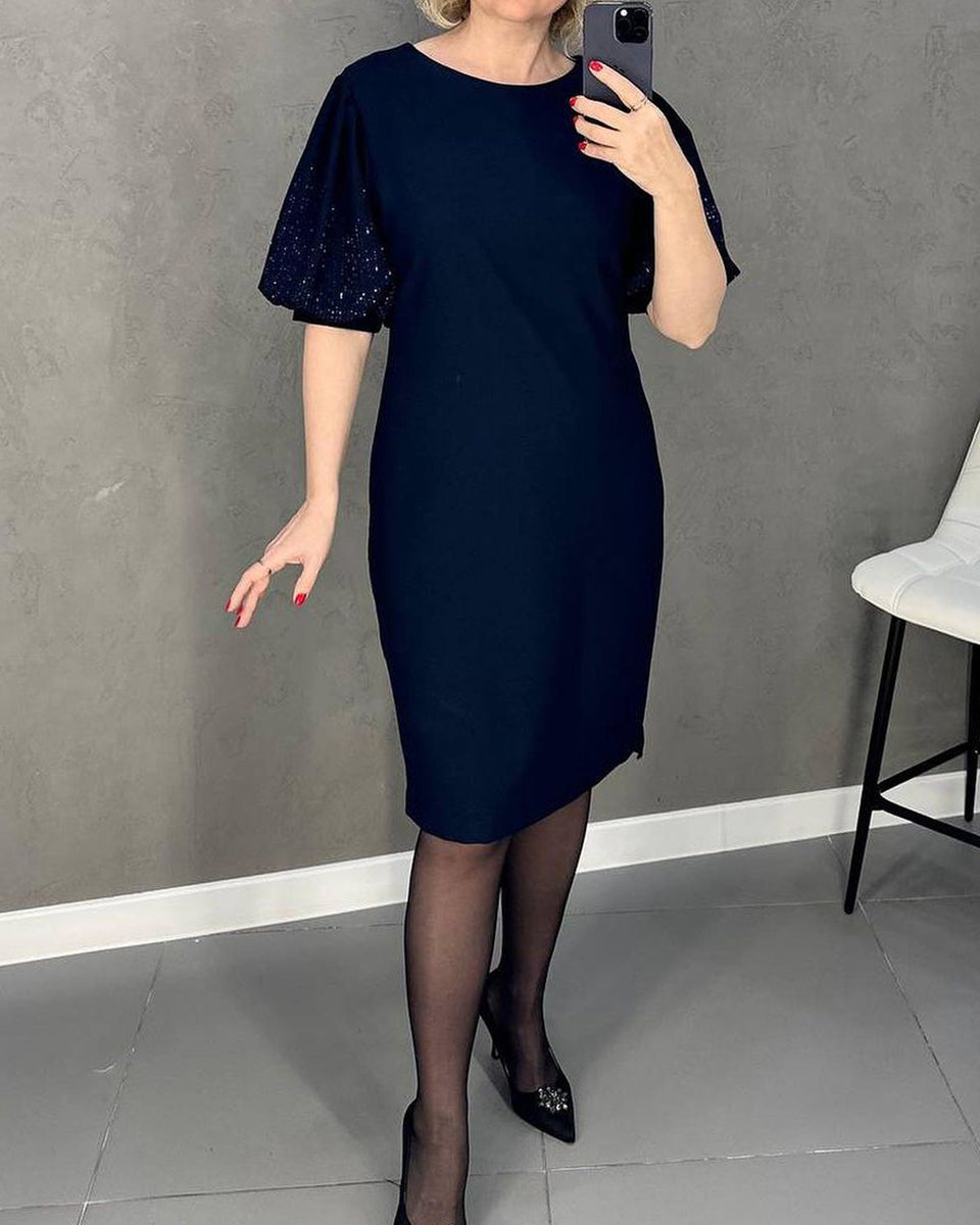 Robe élégante à manches courtes bouffantes