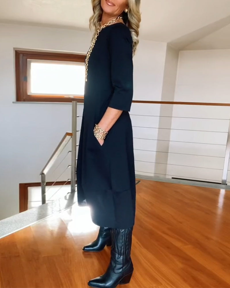 Robe élégante de couleur unie avec poche et col rond