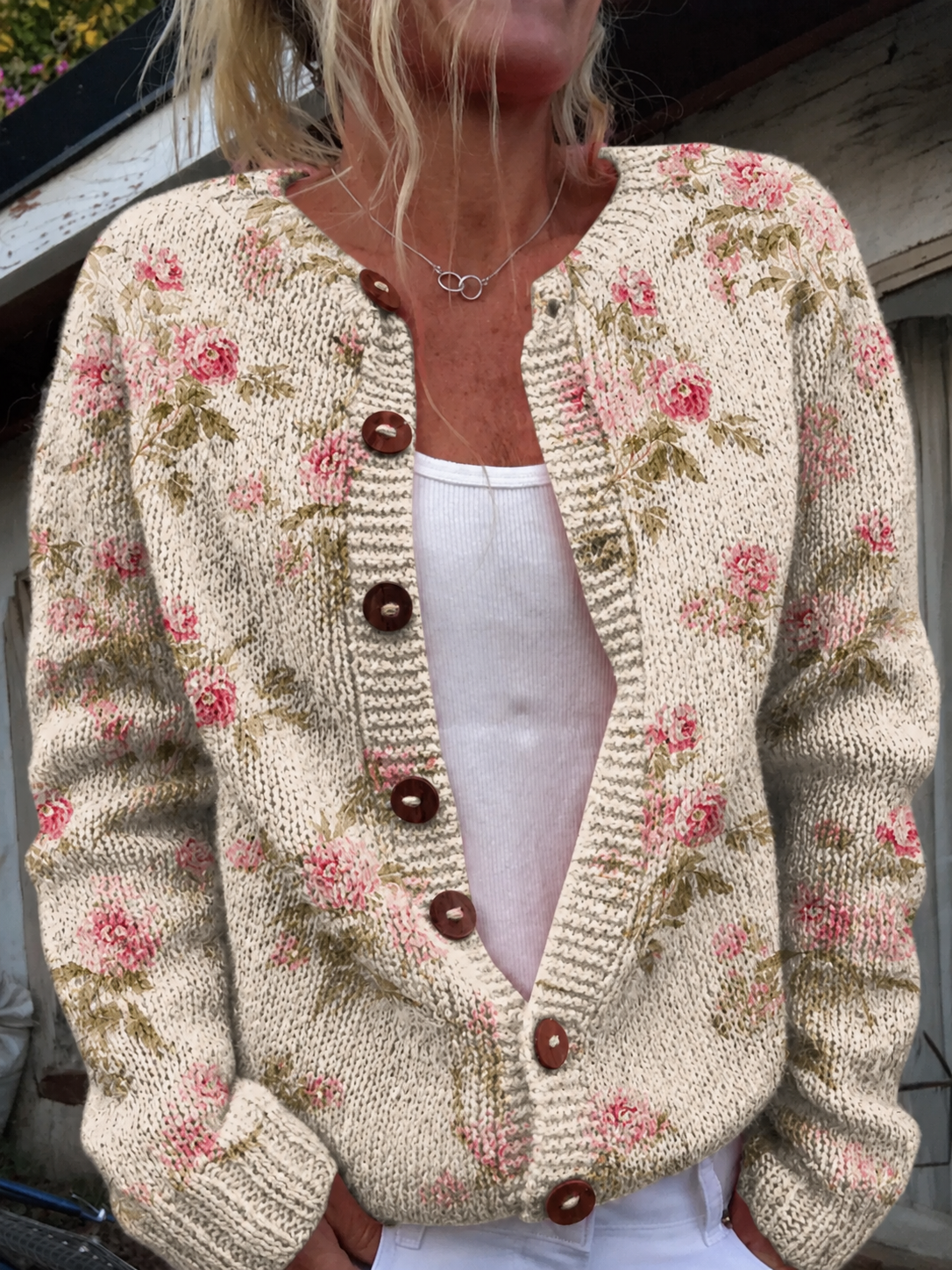 GILET AVEC IMPRIMÉ FLEURS ET FEUILLES ET BOUTONS