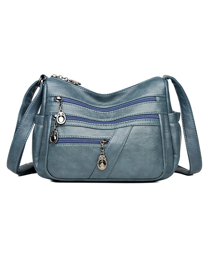 Sac bandoulière en cuir souple avec multipoches