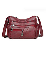 Sac bandoulière en cuir souple avec multipoches