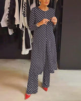 Costume élégant fendu à pois
