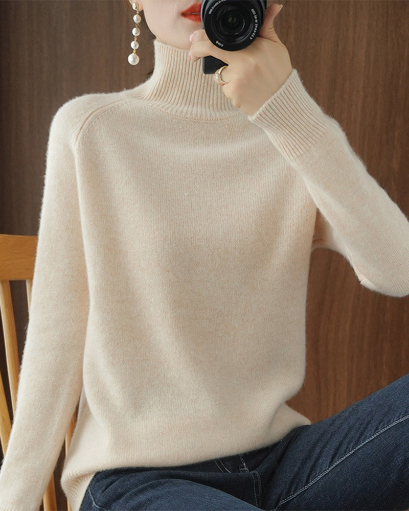 Pull simple à manches longues et col haut de couleur unie