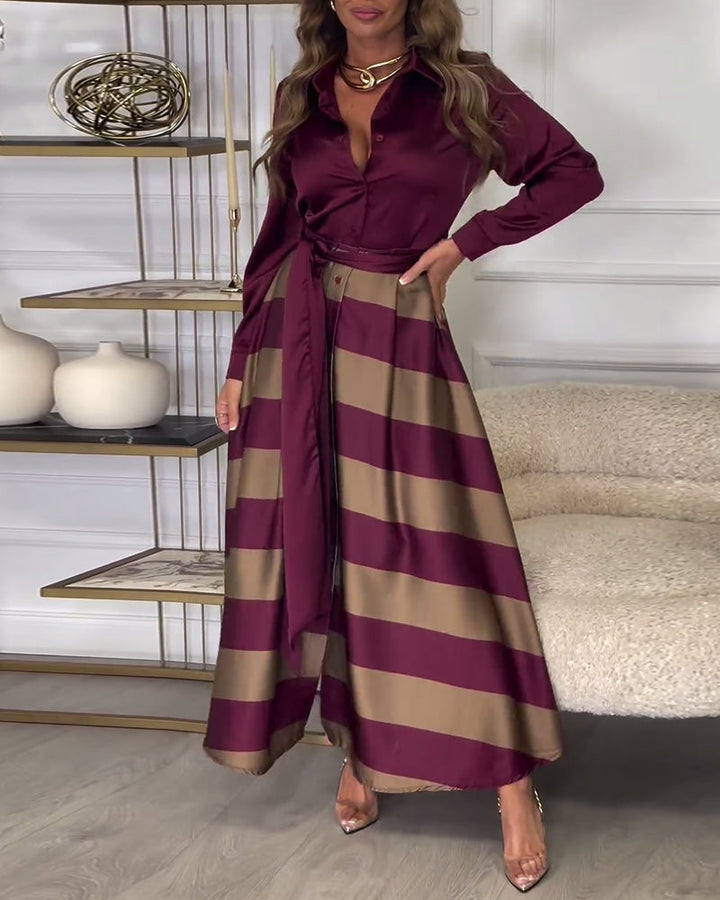 Robe élégante à rayures et à bretelles
