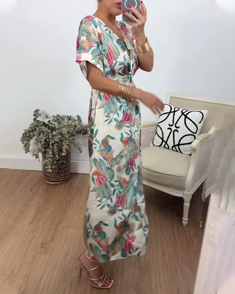 Robe élégante torsadée à col en V et imprimé botanique