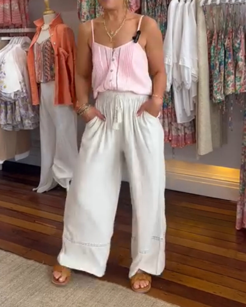 Pantalon large confortable de couleur unie avec poches