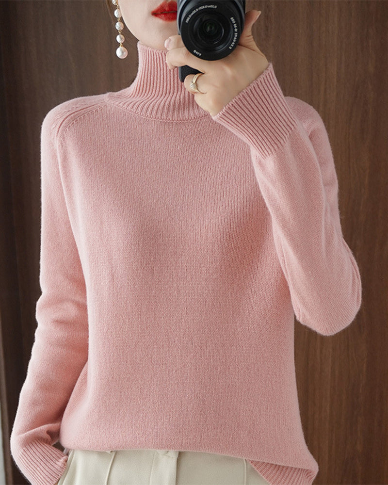 Pull simple à manches longues et col haut de couleur unie