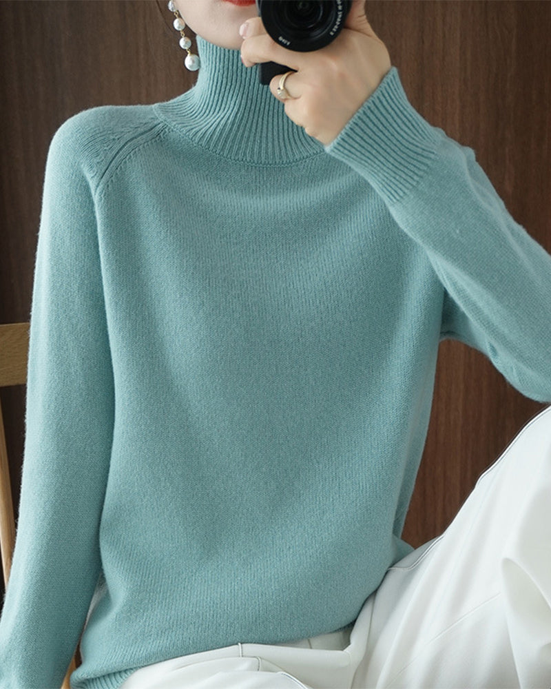 Pull simple à manches longues et col haut de couleur unie