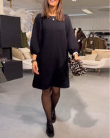 Robe élégante de couleur unie