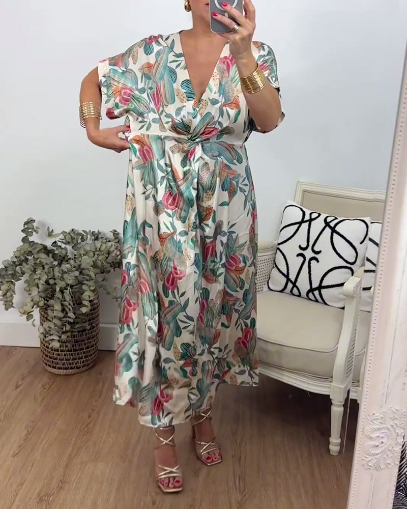 Robe élégante torsadée à col en V et imprimé botanique