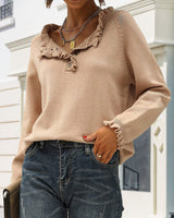 Pull décontracté de couleur unie avec bouton à revers et volants