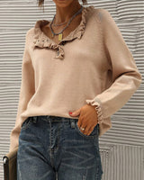 Pull décontracté de couleur unie avec bouton à revers et volants