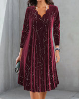 Robe élégante à manches longues et col en V