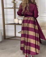 Robe élégante à rayures et à bretelles