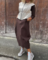 Robe élégante simple à manches longues avec poche de couleur unie