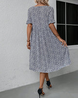 Robe élégante à col rond et imprimé floral