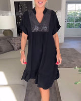 Robe ample plissée col V