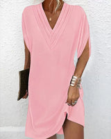 Robe élégante à manches fendues de couleur unie
