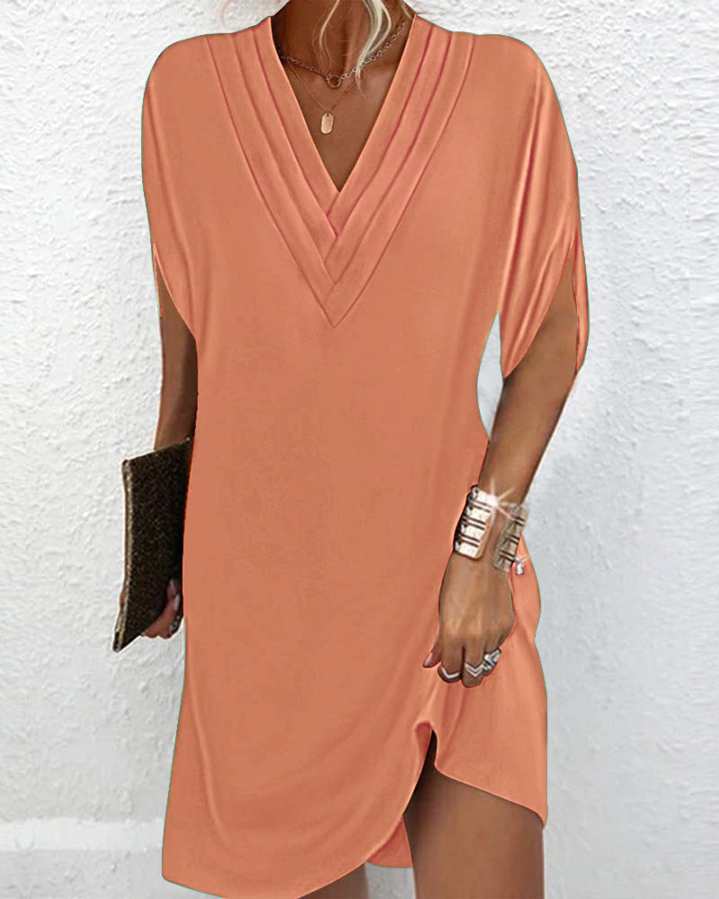 Robe élégante à manches fendues de couleur unie